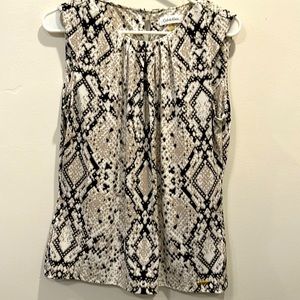 Calvin Klein. Size M. Snakeskin print. No flaws. Black, tan and white.